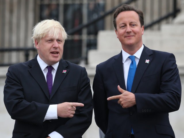 LONDON, ENGLAND - AUGUST 24: Prime Minister David Cameron (R) stands with London Mayor Bo