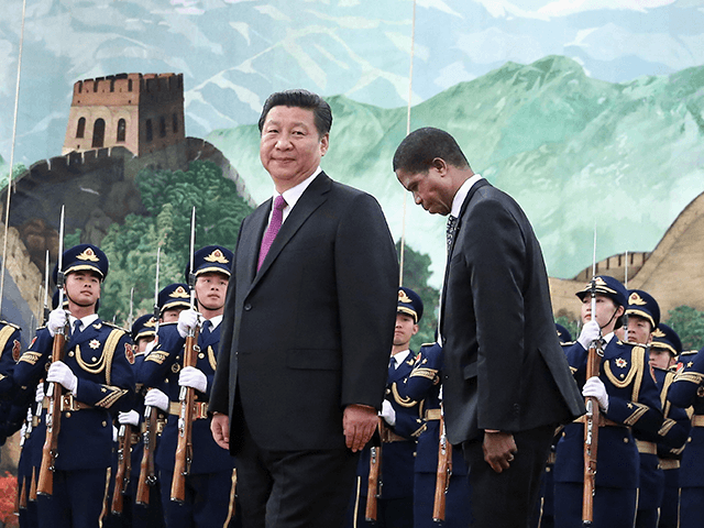 Chinese President Xi Jinping (Left) meets Zambia's President Edgar Chagwa Lungu (Right) at
