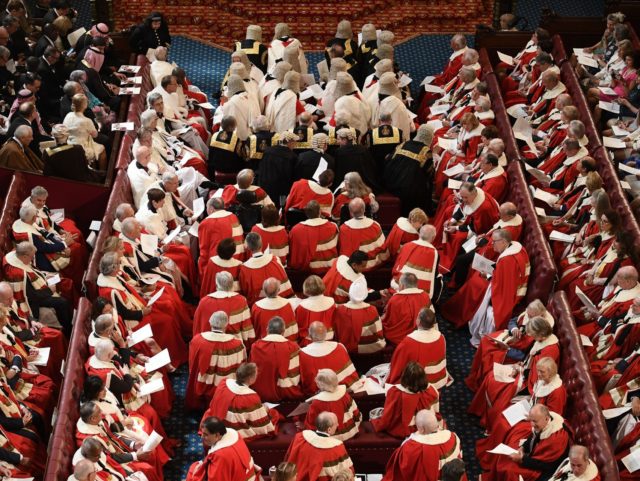 LONDON, ENGLAND - JUNE 21: Peers take their seats in the House of Lords before the State