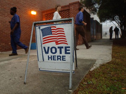 SAVANNAH, GA - FEBRUARY 5: Voters leave a precinct after casting their ballots during Georgia's primary Super Tuesday's presidential election January 5, 2008 in Savannah, Georgia. An enormous cache of delegates is at stake. The two dozen state contests are delivering 1,023 Republican and 1,681 Democratic delegates. (Photo by Stephen …