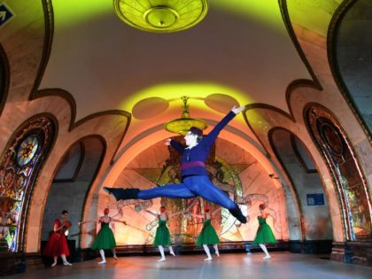 Russian ballet dancers from "The Kremlin ballet" troupe perform during a special night performance in the Novoslobodskaya metro station in Moscow on June 26, 2017. / AFP PHOTO / Yuri KADOBNOV (Photo credit should read YURI KADOBNOV/AFP via Getty Images)