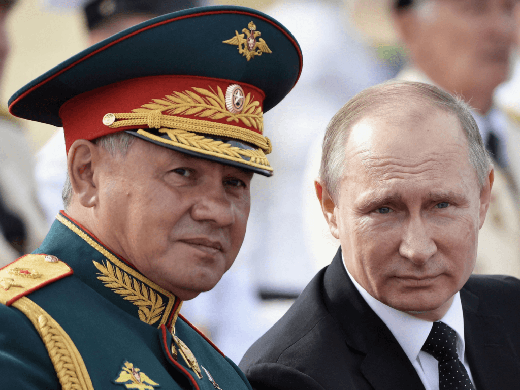Russian President Vladimir Putin (R) and Defence Minister Sergei Shoigu attend a ceremony for Russia's Navy Day in Saint Petersburg on July 30, 2017. - President Vladimir Putin oversaw a pomp-filled display of Russia's naval might as the Kremlin paraded its sea power from the Baltic Sea to the shores of Syria. Some 50 warships and submarines were on show along the Neva River and in the Gulf of Finland off the country's second city of Saint Petersburg after Putin ordered the navy to hold its first ever parade on such a grand scale. (Photo by Olga MALTSEVA / AFP) (Photo by OLGA MALTSEVA/AFP via Getty Images)