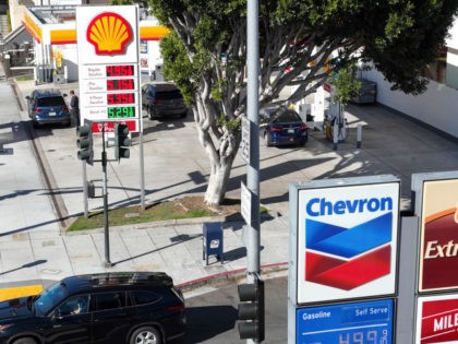 SAN FRANCISCO, CALIFORNIA - FEBRUARY 23: In an aerial view, gas prices over $5.00 a gallon are displayed at gas stations on February 23, 2022 in San Francisco, California. The Ukraine-Russia conflict could push gas prices to record highs in California and across the nation. According to AAA, the average …