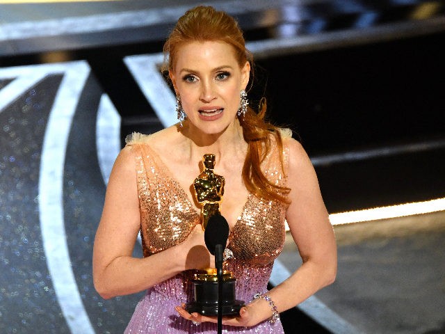 US actress Jessica Chastain accepts the award for Best Actress in a Leading Role for her p
