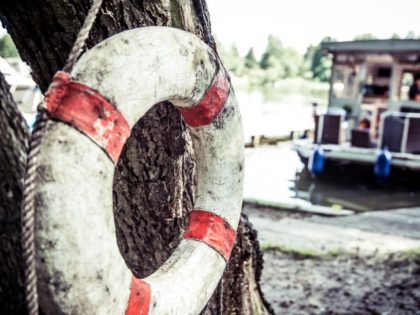 Life buoy with boat in background