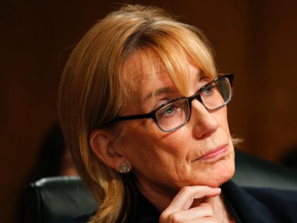 Sen. Maggie Hassan, N.H., listens to testimony from Customs and Border Patrol Acting Commissioner Mark Morgan, during a Senate Homeland Security and Governmental Affairs committee hearing on conditions at the Southern border, Tuesday, July 30, 2019, on Capitol Hill in Washington. (AP Photo/Jacquelyn Martin)