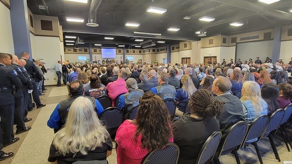 The Coldspring community center was standing room only as the East Texas community turned out to honor the slain deputy. (Bob Price/Breitbart Texas)
