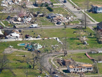 Homes are damaged after a tornado swept through, Wednesday, March 23, 2022, in Arabi, La. A tornado flipped cars, ripped off rooftops and deposited a house in the middle of a street in the New Orleans area, part of a storm front that caused damage in places as it blew …