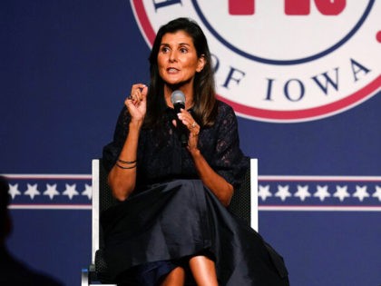 Former Ambassador to the United Nations Nikki Haley speaks during the Iowa Republican Party's Lincoln Dinner as former U.S. Ambassador to China Terry Branstad, right, looks on, Thursday, June 24, 2021, in West Des Moines, Iowa. (AP Photo/Charlie Neibergall)