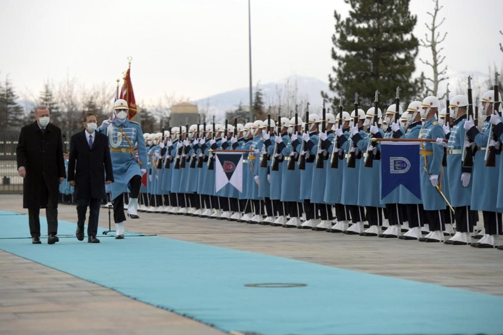 welcome in front of troops and military band