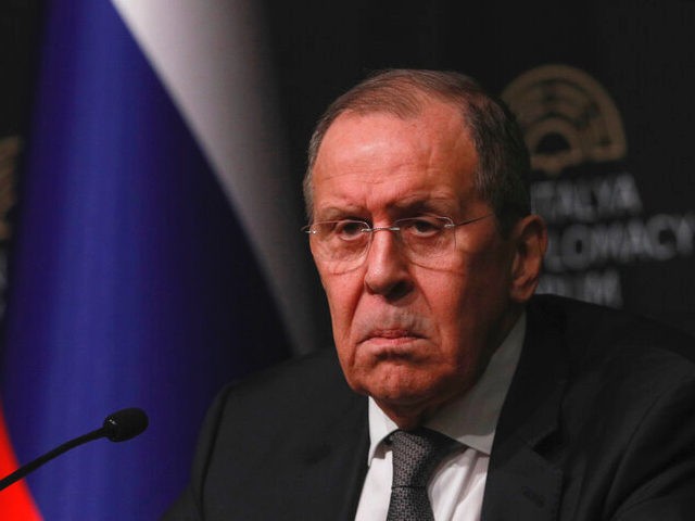 Russia's Foreign Minister Sergey Lavrov talks to journalists during a news conference foll