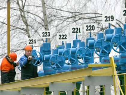 Belarus' workers open the discharge valve of the "Gomel" oil-pump station, part of the "Druzhba" pipeline in Bobovichi, some 330 km south-east of Minsk, 11 January 2007. Belarus has resumed the transit of Russian oil to western Europe though a vital pipeline that was the focus of a bitter dispute …