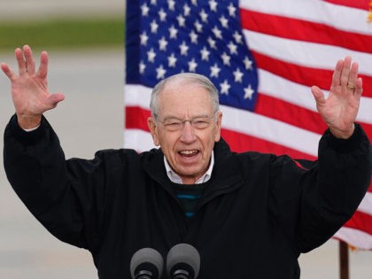 Sen. Chuck Grassley, R-Iowa, attends a campaign event with Vice President Mike Pence at an