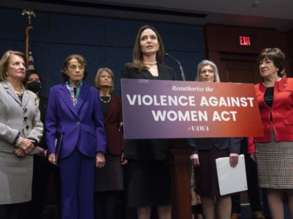Actress and activist Angelina Jolie, center, is joined from left by Sen. Shelley Moore Capito, R-W.Va., Sen. Dianne Feinstein, D-Calif., Sen. Lisa Murkowski, R-Alaska, Sen. Joni Ernst, R-Iowa, and Sen. Susan Collins, R-Maine, at a news conference to announce a bipartisan update to the Violence Against Women Act, at the …