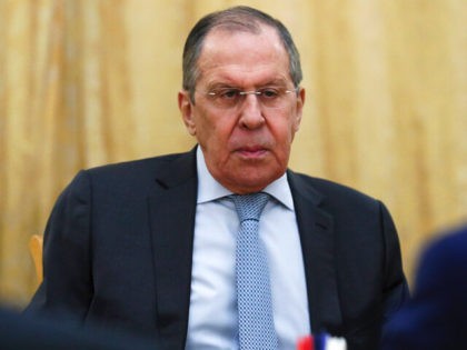 In this handout photo released by Russian Foreign Ministry Press Service, Russian Foreign Minister Sergey Lavrov listens to the U.N. special envoy for Syria Geir Pedersen, right back to a camera, during their talks in Moscow, Russia, Wednesday, Feb. 23, 2022. (Russian Foreign Ministry Press Service via AP)