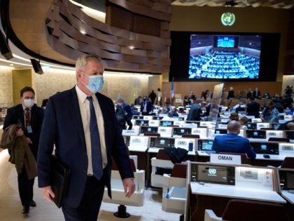 Russian ambassador Gennady Gatilov leaves for a break during an urgent debate on the Ukraine conflict at the UN Human Rights Council in Geneva on March 3, 2022. - The UN human rights chief slammed Russia's attack on Ukraine, warning of a "massive impact" on the rights of millions and …