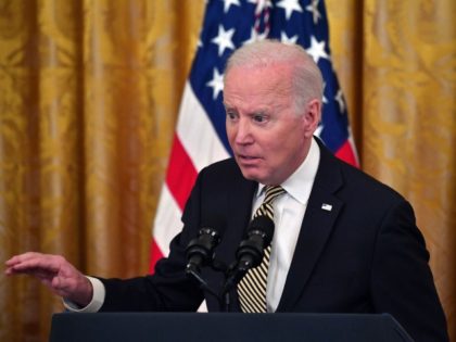 US President Joe Biden speaks during an event celebrating the reauthorization of the Violence Against Women Act, in the East Room of the White House in Washington, DC, on March 16, 2022.