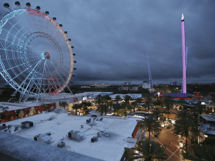 ICON Park attractions, The Wheel, left, Orlando SlingShot, middle, and Orlando FreeFall, r