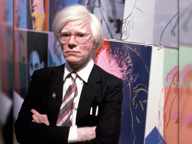 The American artist and filmmaker Andy Warhol with his paintings(1928 - 1987), December 15