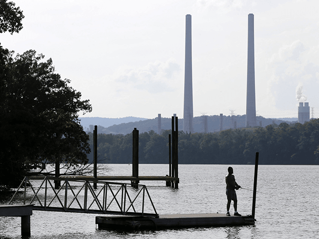 In this Aug. 7, 2019, file photo, a man fishes at William B. Ladd Park near the Kingston F