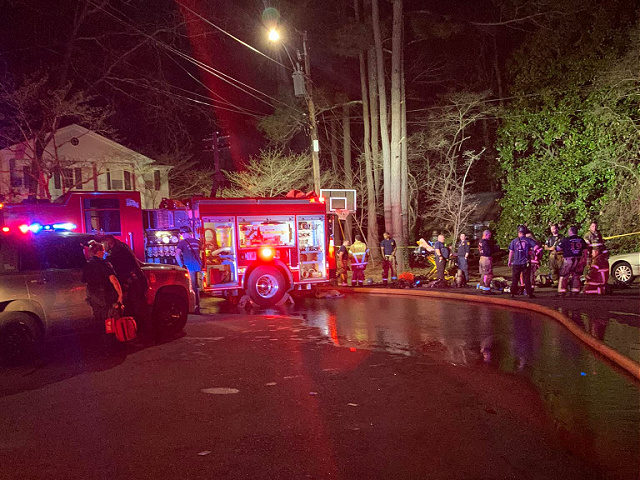 Police officers saved an individual trapped by a fire in Dunwoody, Georgia, on Sunday, and