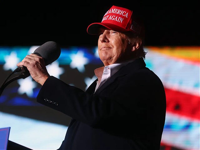 FLORENCE, ARIZONA - JANUARY 15: Former President Donald Trump prepares to speak at a rally at the Canyon Moon Ranch festival grounds on January 15, 2022 in Florence, Arizona. The rally marks Trump's first of the midterm election year with races for both the U.S. Senate and governor in Arizona …