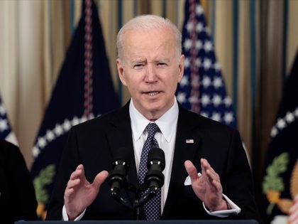 WASHINGTON, DC - MARCH 28: U.S. President Joe Biden speaks along side Director of the Offi