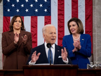 WASHINGTON, DC - MARCH 01: US President Joe Biden arrives to deliver the State of the Union address as U.S. Vice President Kamala Harris (L) and House Speaker Nancy Pelosi (D-CA) look on during a joint session of Congress in the U.S. Capitol House Chamber on March 1, 2022 in …