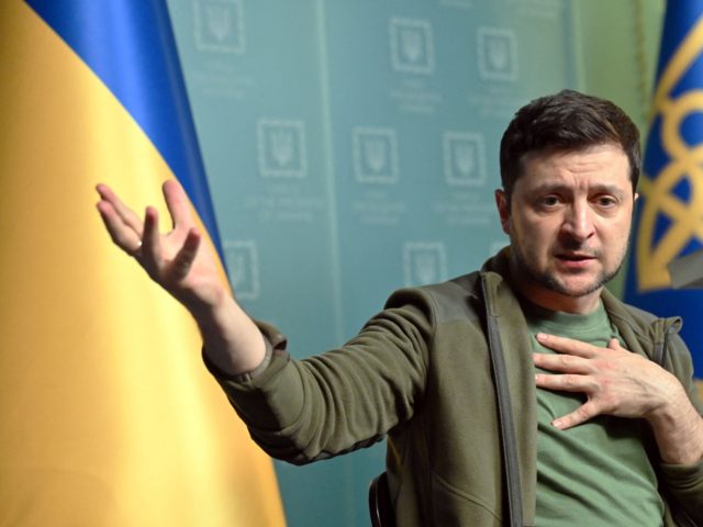 Ukrainian President Volodymyr Zelensky gestures as he speaks during a press conference in