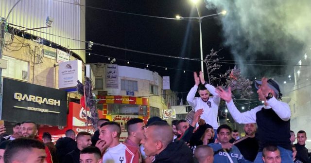 PICTURES: Palestinians Celebrate, Hand out Candy After Terror Attack that Killed 5 in Tel Aviv