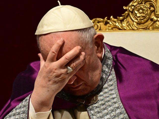 Pope Francis prays during a penitential celebration service at St. Peter's Basilica on Mar