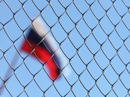 russian-flag-fence-boycott-istock-getty