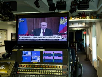 WASHINGTON, DC - FEBRUARY 21: A TV screen in the James S. Brady Press Briefing Room of the White House airs Russian President Vladimir Putin's live remarks from the Kremlin on February 21, 2022 in Washington, DC. U.S. President Joe Biden is spending the Presidents Day holiday meeting with his …