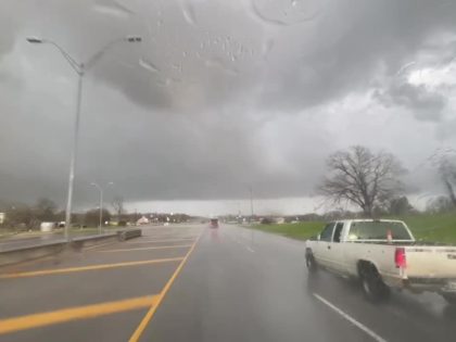 A tornado tried to lift a truck into the air in Elgin, Texas, on Monday and the person inside eventually drove away from the scene.