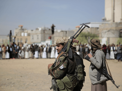 Houthis White House - Armed Houthi fighters attend the funeral procession of Houthi rebel