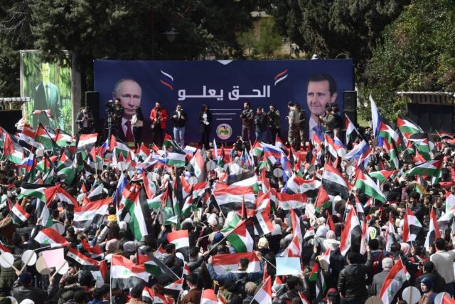 Students demonstrate in support of Russia following its invasion of Ukraine, at a university campus in the Syrian city of Aleppo on March 10, 2022