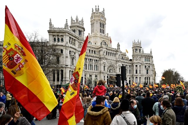 Thousands rallied outside City Hall in Madrid to denounce the Spanish government over soar