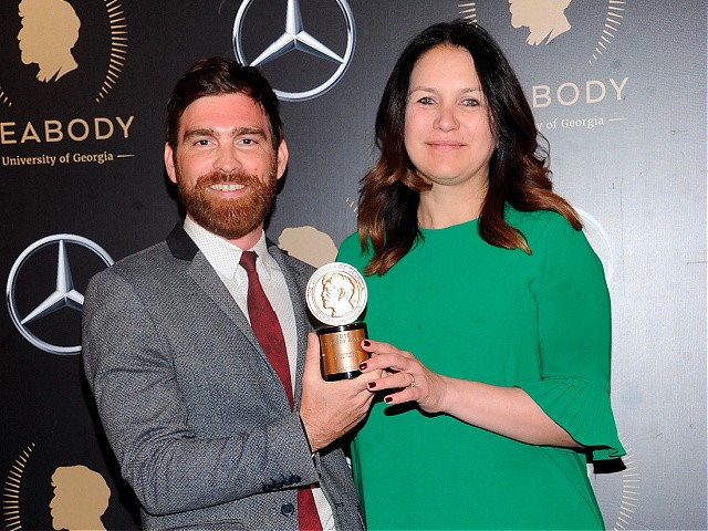 FILE - Andy Mills, left, and Rukmini Callimachi hold the award for their 2018 podcast “Caliphate” at the 78th annual Peabody Awards in New York on May 18, 2019. The New York Times says it was wrong to trust the story of a Canadian man whose claims of witnessing and participating in atrocities as a member of the Islamic State was a central part of its award-winning 2018 podcast “Caliphate.” The 12-part series won a Peabody Award and was a Pulitzer Prize finalist. But it began to unravel when Canadian authorities in September arrested Shehroze Chaudhry on charges of perpetrating a terrorist hoax. He was included in the podcast under the alias Abu Huzayfah. The Times said its journalists should have done a better job vetting him, and not included his story as part of the podcast. (Photo by Brad Barket/Invision/AP, FIle)