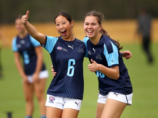 Judie Goldman of Vic Metro and Tiger Doultree of Vic Metro warm up during the AFL Under 16 Girls Championship match between Vic Country and Vic Metro at La Trobe University Sports Fields on April 21, 2022, in Melbourne, Australia.