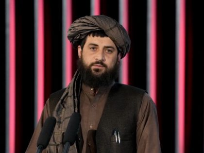 Afghan Taliban's Acting Minister of Defence Mullah Mohammad Yaqoob speaks during a ceremony marking the 9th anniversary of the death of Mullah Mohammad Omar, the late leader and founder of the Taliban, in Kabul, Afghanistan, Sunday, April 24, 2022. (AP Photo/Ebrahim Noroozi)