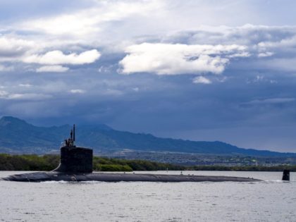 FILE - In this file photo provided by U.S. Navy, the Virginia-class fast-attack submarine USS Missouri (SSN 780) departs Joint Base Pearl Harbor-Hickam for a scheduled deployment in the 7th Fleet area of responsibility, Sept. 1, 2021. Australia decided to invest in U.S. nuclear-powered submarines and dump its contract with …