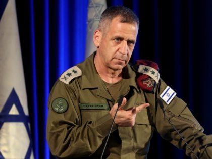 Israeli Armed Forces Chief of Staff Lt. Gen. Aviv Kochavi takes part in a candle lightning ceremony with Israeli soldiers on the Jewish holiday of Hanukkah in Jerusalem on November 29, 2021. - Bennett earlier charged that Iran was re-entering talks on its nuclear programme to seek sanctions relief in …