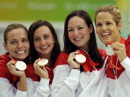 United States' Dara Torres, Christine Magnuson, Rebbeca Soni, and Natalie Coughlin show their silver medals after the women's 4x100-meter medley relay final during the swimming competitions in the National Aquatics Center at the Beijing 2008 Olympics in Beijing, Sunday, Aug. 17, 2008.