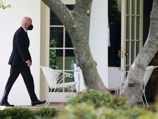 President Joe Biden arrives back at the White House after attending the funeral service for former Secretary of State Madeleine Albright at the Washington National Cathedral, Wednesday, April 27, 2022, in Washington.
