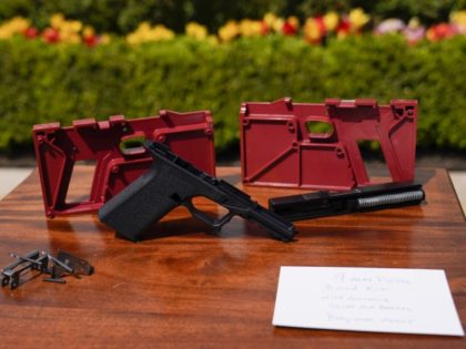 A 9mm pistol build kit with a commercial slide and barrel with a polymer frame is displayed before President Joe Biden and Deputy Attorney General Lisa Monaco speak in the Rose Garden of the White House in Washington, Monday, April 11, 2022, to announces a final version of its ghost …