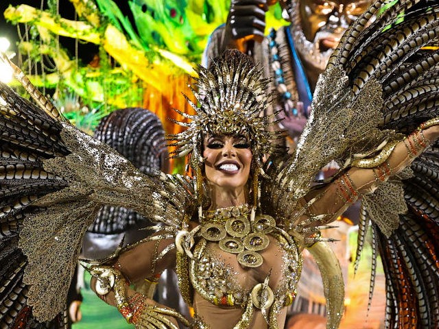 A member of Vila Isab samba school performs during the Special Group Parade on day four of