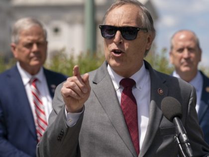 Rep. Andy Biggs (R-AZ), center, speaks, at a news conference with Rep. Ralph Norman (R-SC), back left, and Rep. Dan Bishop, (R-NC), Wednesday, May 12, 2021, as they express their opposition to "critical race theory," on Capitol Hill in Washington.
