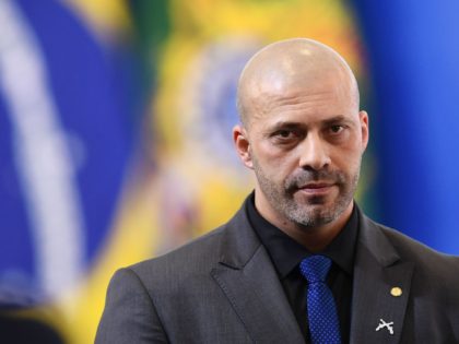 Brazilian deputy Daniel Silveira attends the inauguration ceremony of new ministers at Planalto Palace in Brasilia, on March 31, 2022. - Silveira, a pro-Bolsonaro congressman accused of promoting anti-democratic acts in Brazil, has been barricaded inside Congress since the night of March 29, in defiance of a Supreme Court judge's …