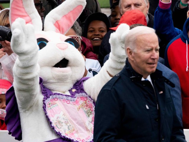 The Easter Bunny gestures to President Joe Biden during the annual Easter egg roll on the