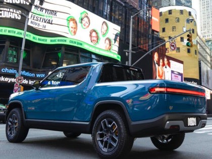 IMAGE DISTRIBUTED FOR RIVIAN AUTOMOTIVE, LLC - Rivian R1T all-electric truck in Times Square on listing day, on Wednesday, Nov. 10, 2021 in New York. Electric vehicle maker Rivian Automotive will announce Thursday, Dec. 15, that it's building a $5 billion battery and assembly plant east of Atlanta that's projected …